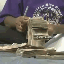 a photo of pawpaw counting money